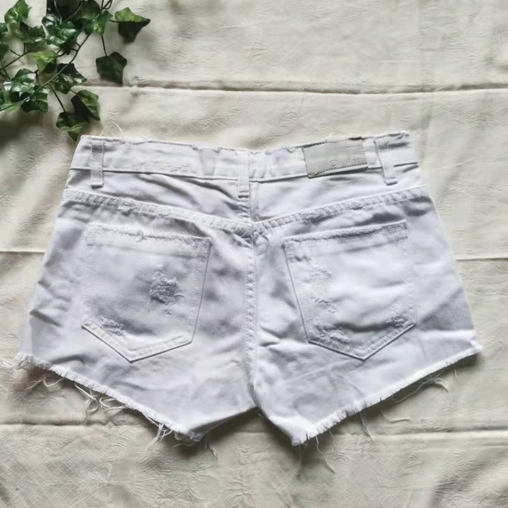 White distressed jean shorts. - Picture 2 of 6